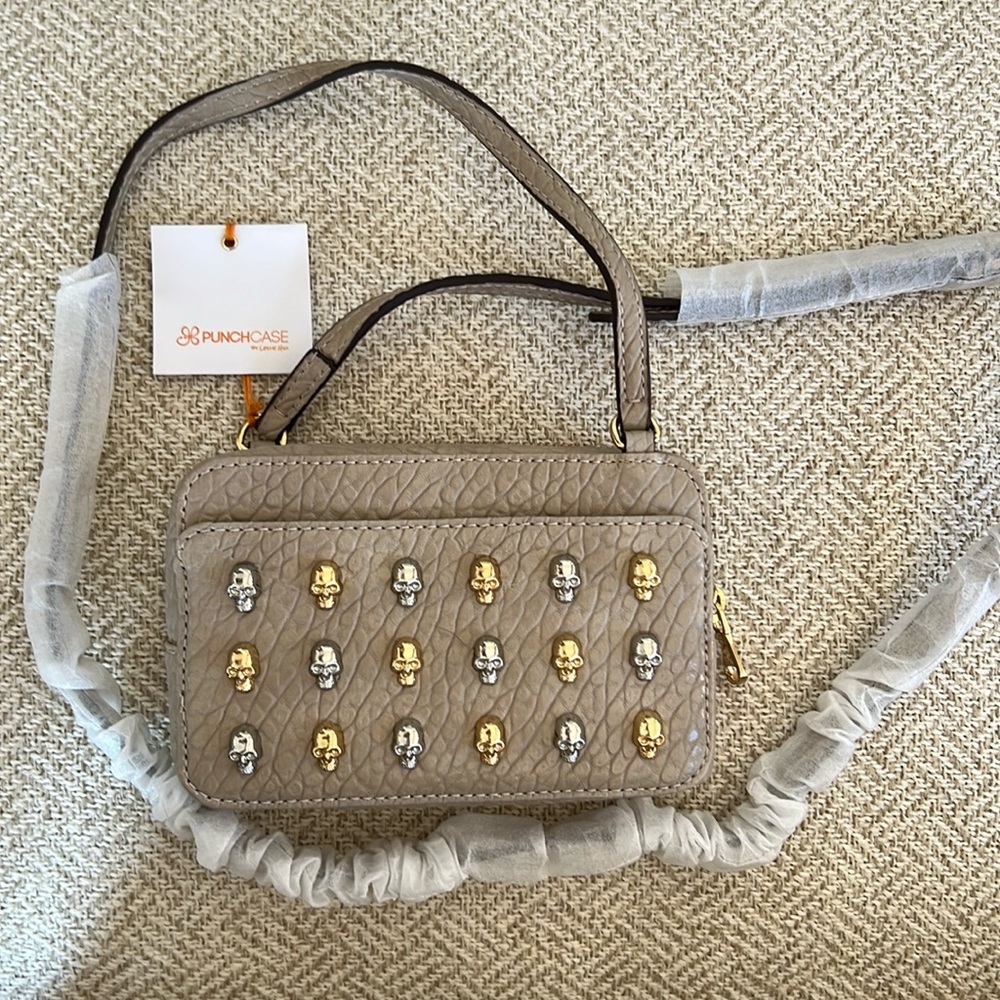 Tan pebbled vegan leather Braxton x-body.